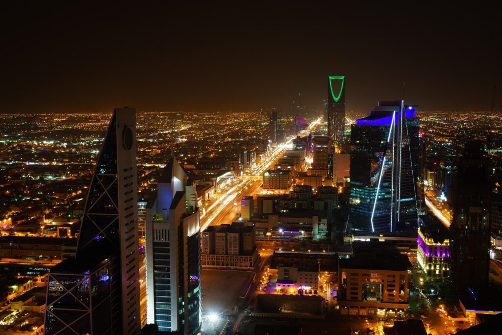 Riyadh skyline, and desert camel riding adventure, highlighting rich history, luxury, and cultural travel experiences."