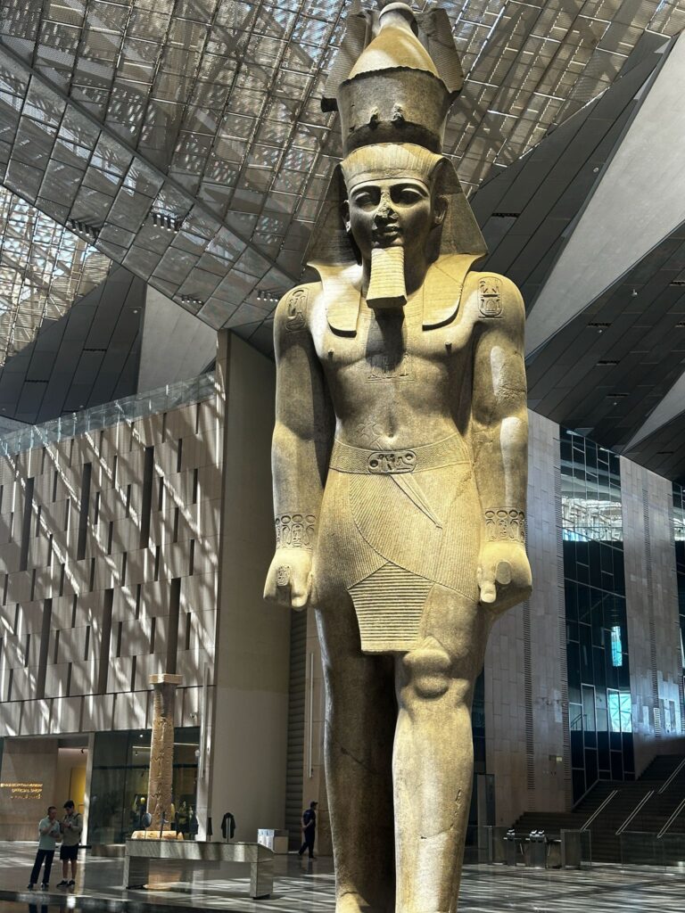 Colossal statue of Pharaoh Ramses II displayed at the Grand Egyptian Museum entrance in Giza, Egypt